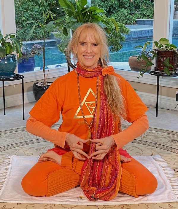 Yogini Kaliji leading live online TriYoga class