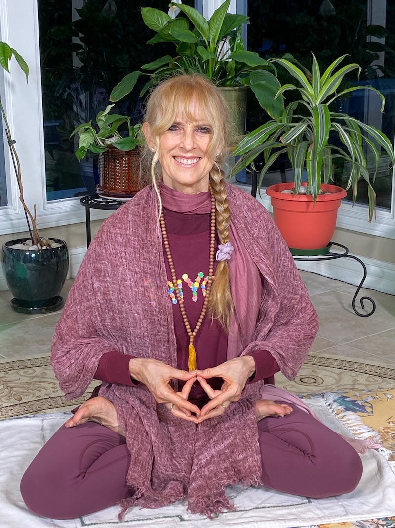 Yogini Kaliji leading live online TriYoga class